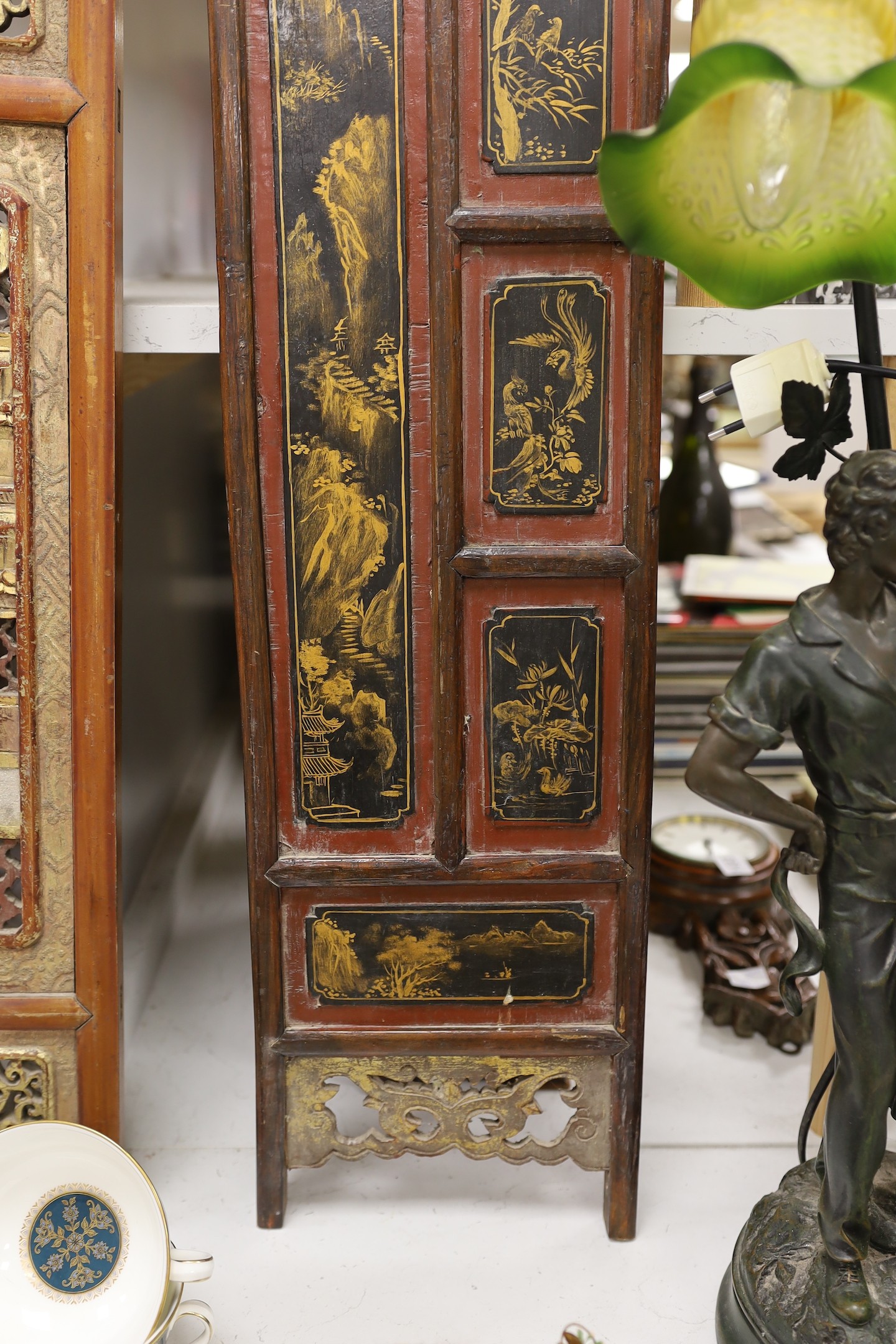 A pair of late 19th century Chinese gilt-decorated lacquer panels and a similar smaller rectangular pierced panel, tallest 91cms high